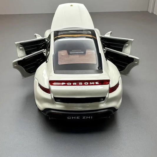 1:32 scale white Porsche luxury sports car model with black accents and realistic detailing.