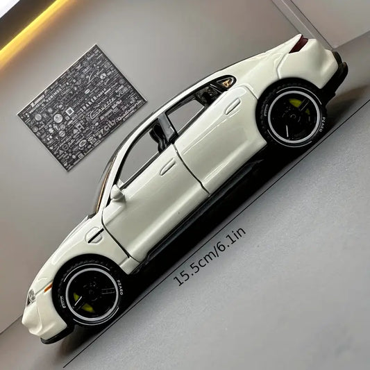 1:32 scale white Porsche luxury sports car model with black accents and realistic detailing.