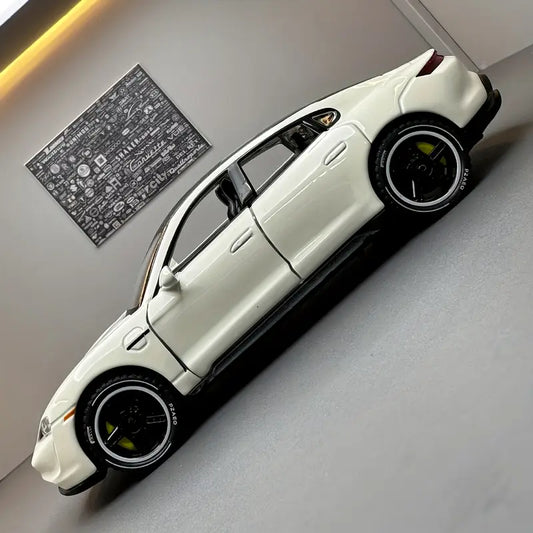1:32 scale white Porsche luxury sports car model with black accents and realistic detailing.
