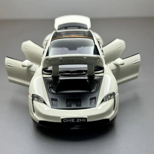 1:32 scale white Porsche luxury sports car model with black accents and realistic detailing.