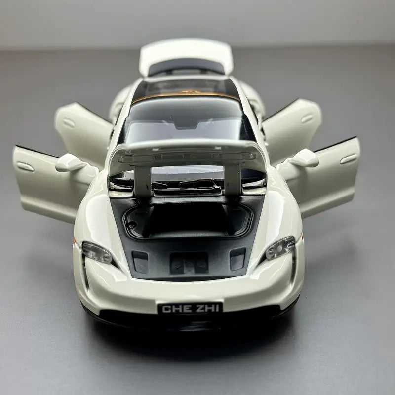 1:32 scale white Porsche luxury sports car model with black accents and realistic detailing.