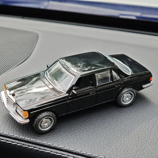 1:36 scale alloy double-door classic car model in vintage black metallic finish with chrome accents and black wheels.