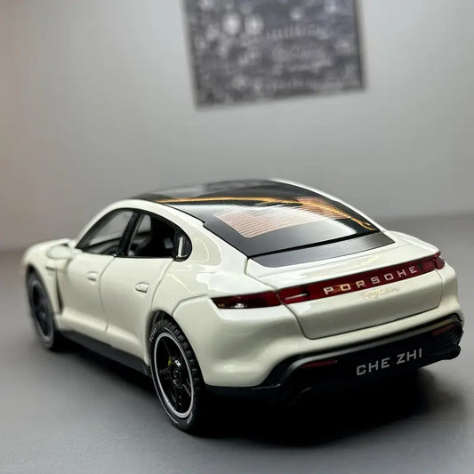 1:32 scale white Porsche luxury sports car model with black accents and realistic detailing.