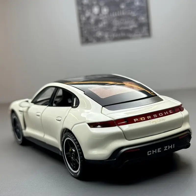 1:32 scale white Porsche luxury sports car model with black accents and realistic detailing.
