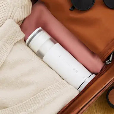 Green Lion 3-in-1 portable iron, lint remover, and power bank in a compact design" "Multifunctional Green Lion gadget featuring a portable iron, lint remover, and power bank" "Versatile 3-in-1 device by Green Lion: portable iron, lint remover, and power bank" "Travel-friendly Green Lion 3-in-1 tool combining an iron, lint remover, and power bank" "Green Lion's innovative 3-in-1 portable iron, lint remover, and power bank for on-the-go use